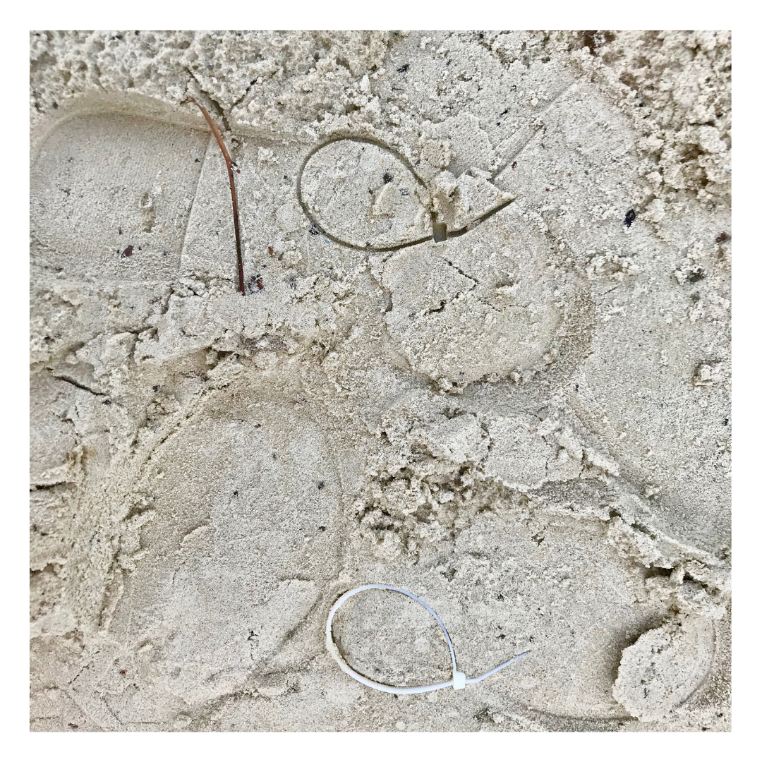 Luftballon-Abdruck im Sand
